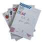 Each folded notecard includes dotted-line writing areas and drawing sections.